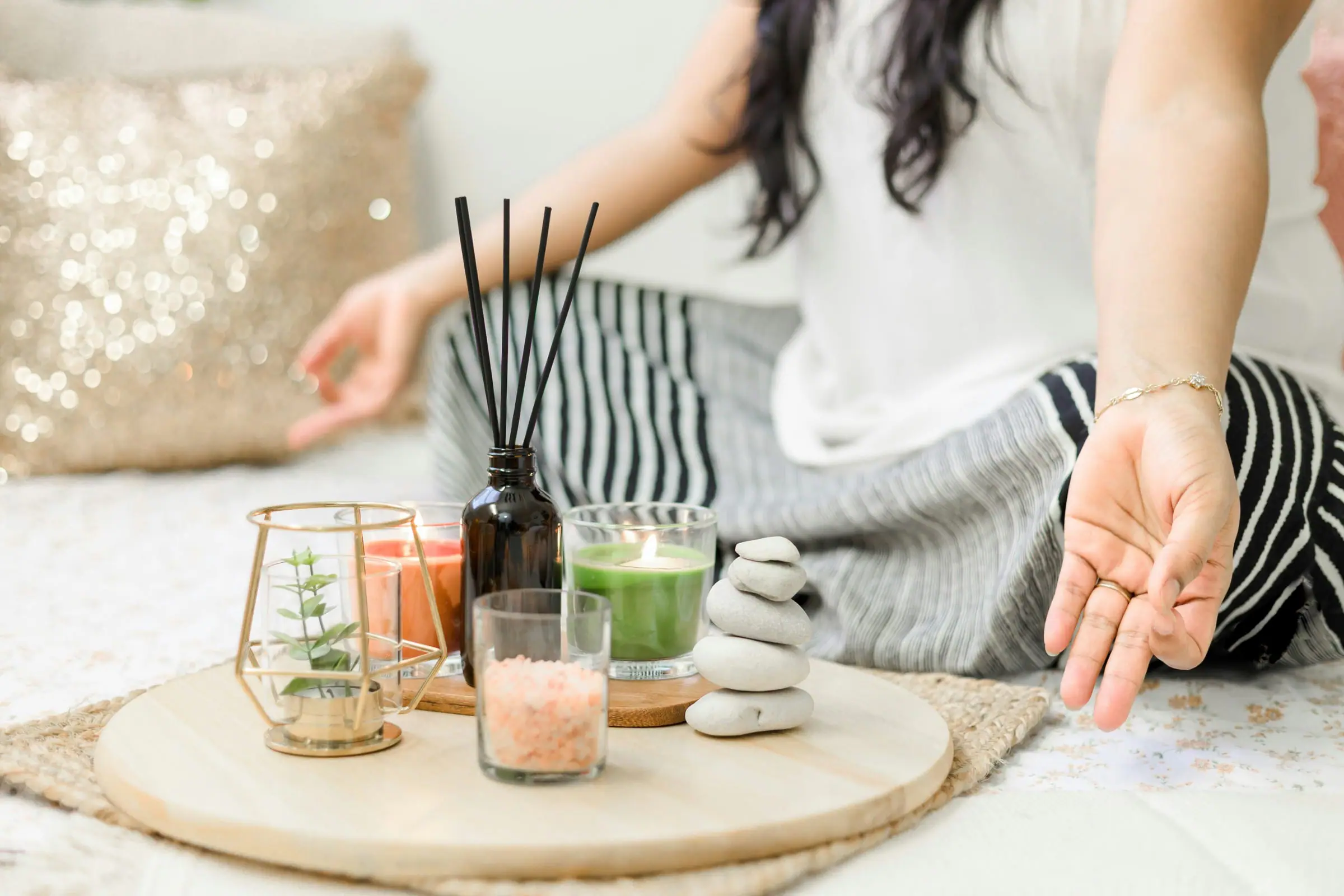A selection of candles arranged on a home ritual tray