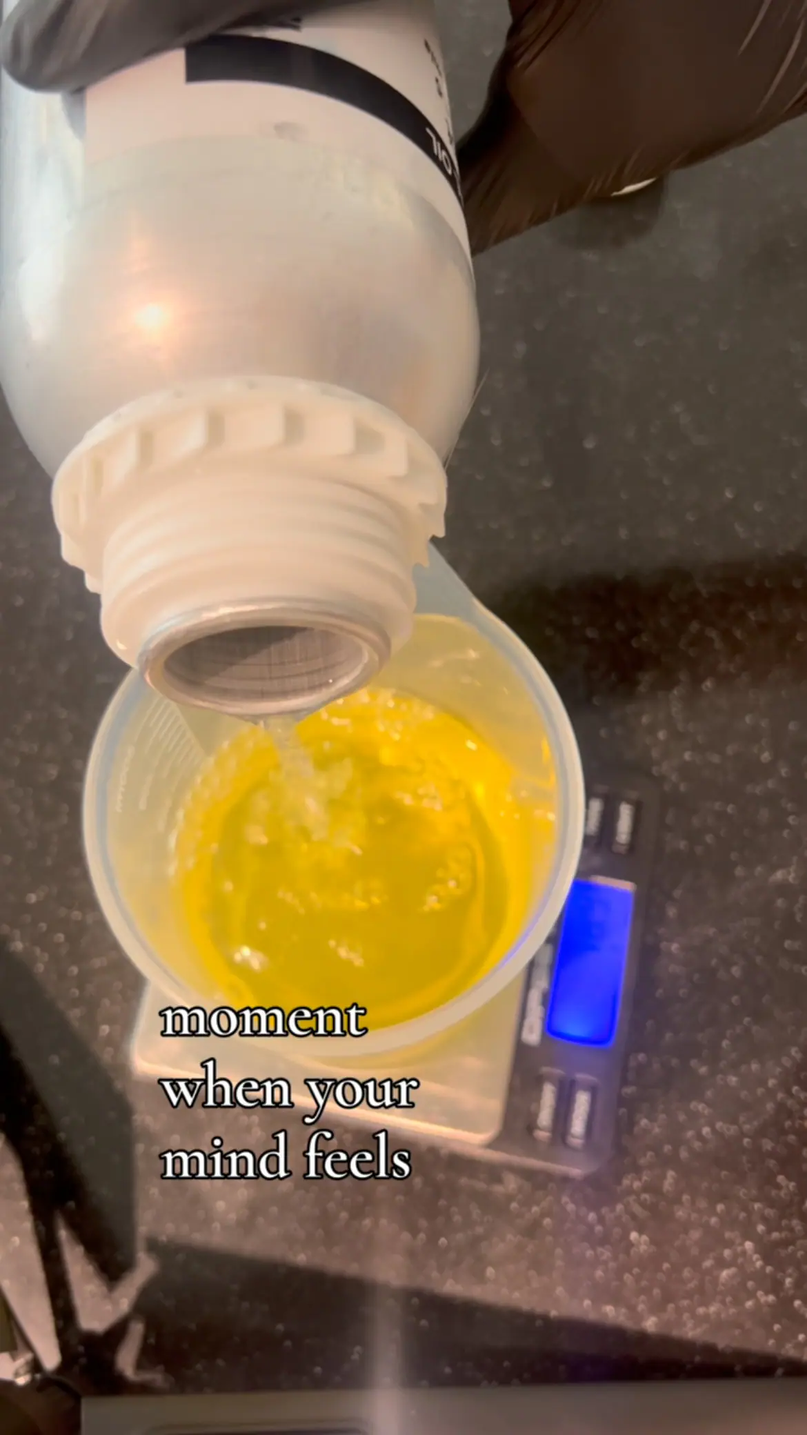 Pouring an essential-oil blend by hand