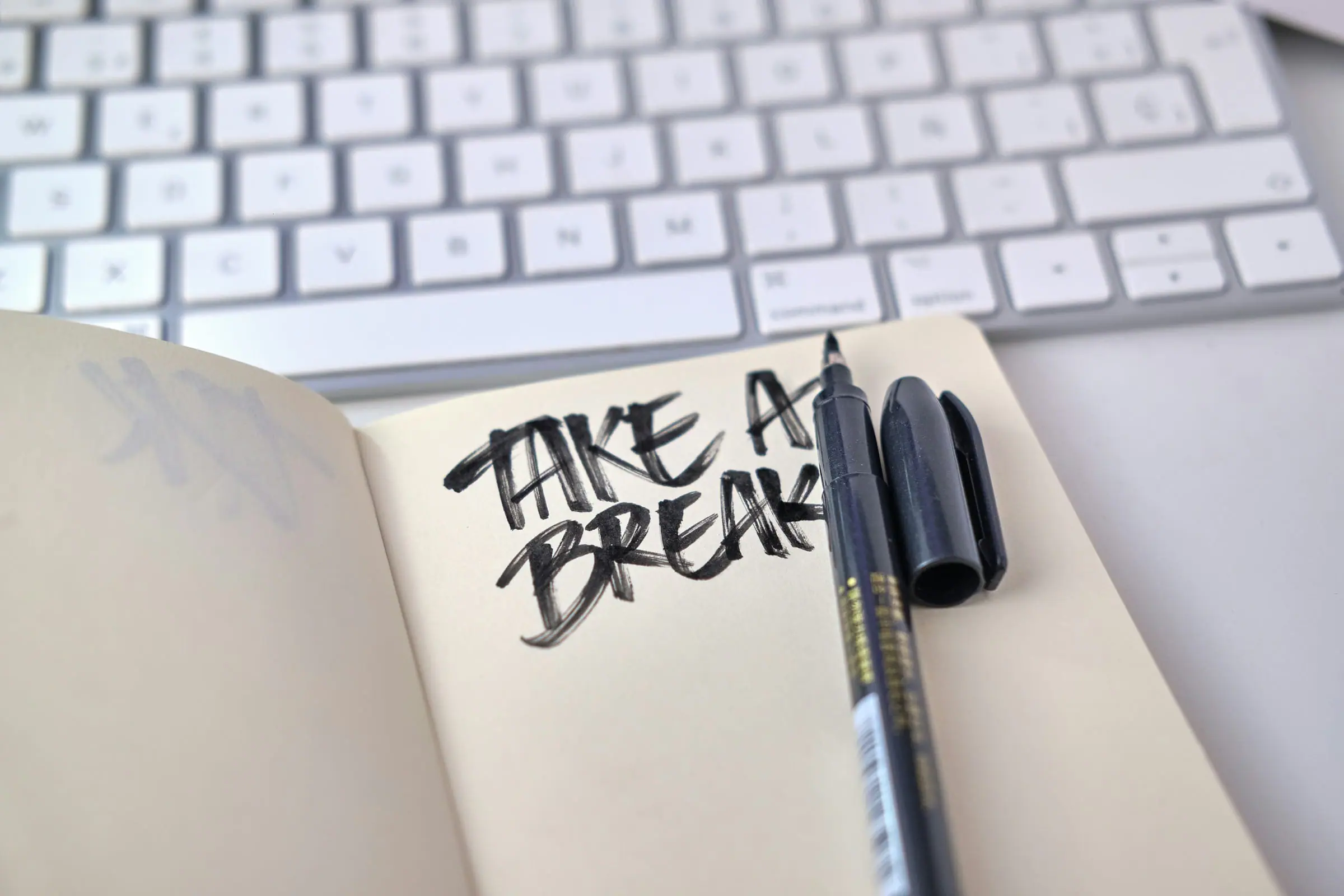 A handwritten reminder to take a break during a screen-light evening